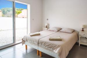 Postel nebo postele na pokoji v ubytování Villa Terre des Vins by Villa Plus