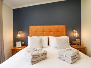 Ένα ή περισσότερα κρεβάτια σε δωμάτιο στο Sunset Lodge