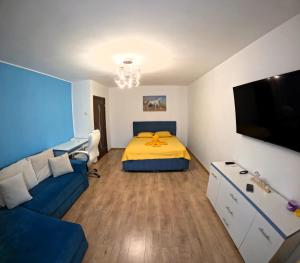 Ένα ή περισσότερα κρεβάτια σε δωμάτιο στο Turquoise Studio Nerva Traian