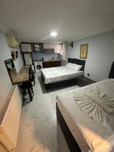 Postel nebo postele na pokoji v ubytování AWWA APART HOTEL
