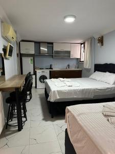 Postel nebo postele na pokoji v ubytování AWWA APART HOTEL