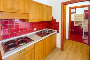 A kitchen or kitchenette at Borgo Stalle Residence