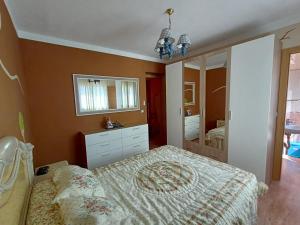 Postel nebo postele na pokoji v ubytování Hospedaje casaAlfredo