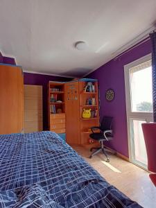 Postel nebo postele na pokoji v ubytování Hospedaje casaAlfredo