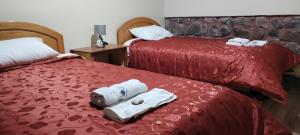 Postel nebo postele na pokoji v ubytování Casa Amaru Raqchi