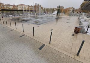 a fountain in the middle of a plaza at Workshop in Béziers