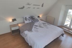 Postel nebo postele na pokoji v ubytování Gîte fleur du paradis