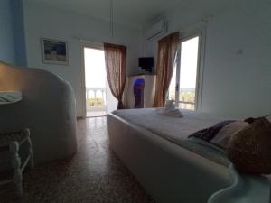 Postel nebo postele na pokoji v ubytování Anassa Studios