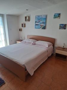 Postel nebo postele na pokoji v ubytování Appartamento Marina di Pisticci-Marconia