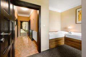 Posteľ alebo postele v izbe v ubytovaní Villa Daniela