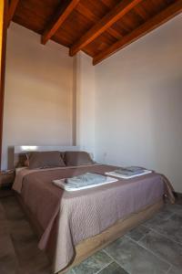 Ένα ή περισσότερα κρεβάτια σε δωμάτιο στο SternesVillage, Premium Balcony Suite