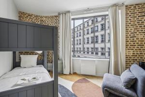 Krevet ili kreveti u jedinici u okviru objekta Amazing Montorgueil