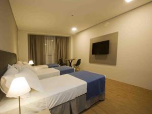 TV a/nebo společenská místnost v ubytování Fity Hotel