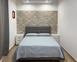Postel nebo postele na pokoji v ubytování La Casa Di Federico II