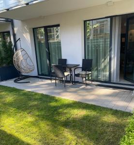 Κήπος έξω από το REZYDENCJA NIECHORZE Apart 123 ogrodzony ogródek przy plaży