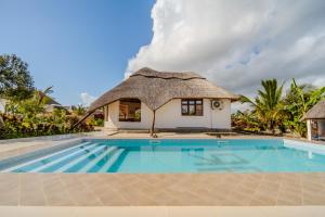 Φωτογραφία από το άλμπουμ του Zaria Garden Bungalows σε Pwani Mchangani