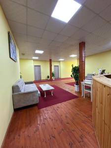 Rúm í herbergi á Bar Restaurant Hotel Gysi