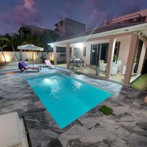 Bazén v ubytování Villa Le Mahé, Mahébourg nebo v jeho okolí