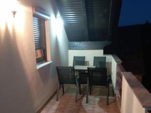 a dining room with a table and chairs at Petra in Livno