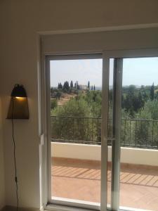 Balkón nebo terasa v ubytování Hillside Villa