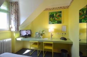 TV o dispositivi per l'intrattenimento presso Hôtel Vauban
