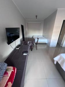 TV a/nebo společenská místnost v ubytování Ciity Hotel ijui
