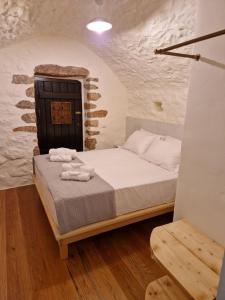 Ένα ή περισσότερα κρεβάτια σε δωμάτιο στο Krialianika House