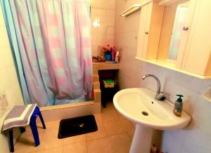 Koupelna v ubytování AGAPI apartments + 40 fotografií