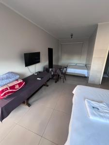 TV a/nebo společenská místnost v ubytování Ciity Hotel ijui
