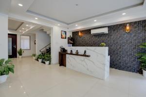 Vstupní hala nebo recepce v ubytování The Paras Studio Serviced Apartments