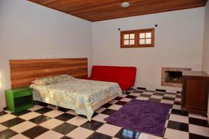 Cama o camas de una habitación en Colinas de Cabreúva