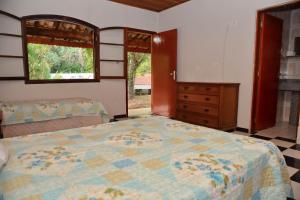 Cama o camas de una habitación en Colinas de Cabreúva