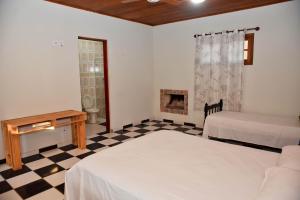 Cama o camas de una habitación en Colinas de Cabreúva