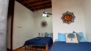 Postel nebo postele na pokoji v ubytování san carlos beach inn