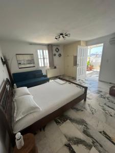 Ένα ή περισσότερα κρεβάτια σε δωμάτιο στο Bellissimo apartment Naxos