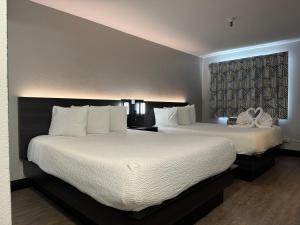 Postel nebo postele na pokoji v ubytování Motel 6 Hollywood