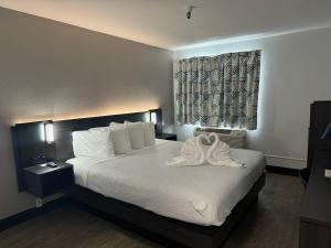 Postel nebo postele na pokoji v ubytování Motel 6 Hollywood