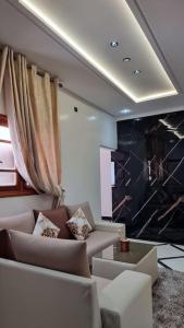 Spacieux Appartement的休息区