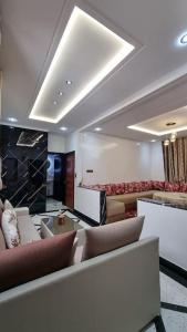 Spacieux Appartement的休息区