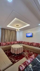Spacieux Appartement的休息区