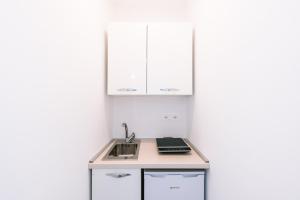 O bucătărie sau chicinetă la Casa Don Matteo