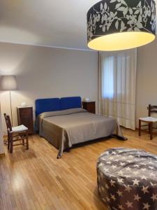 Postel nebo postele na pokoji v ubytování B&B Paolo e Francesca