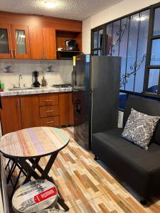 Kuchyň nebo kuchyňský kout v ubytování APARTASUITES BOGOTA 53 - 101a