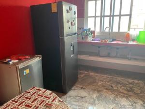 Eldhús eða eldhúskrókur á Hostal MJ