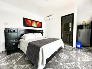 Voodi või voodid majutusasutuse Caribbean Island Hotel toas