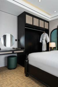 Postel nebo postele na pokoji v ubytování Hanoi International Hotel