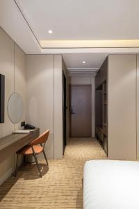 TV a/nebo společenská místnost v ubytování Hanoi International Hotel