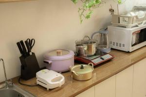 Hanoi Canvas Homee in Hoan Kiemにあるキッチンまたは簡易キッチン