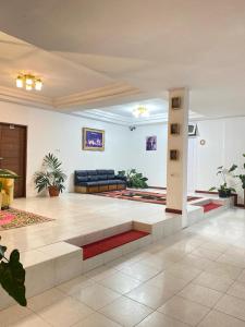 Χώρος καθιστικού στο Hotel Ompu Herti