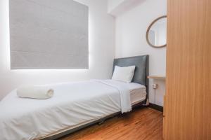 Fotografie z fotogalerie ubytování Homey and Nice 2BR at Cinere Resort Apartment By Travelio v destinaci Depok